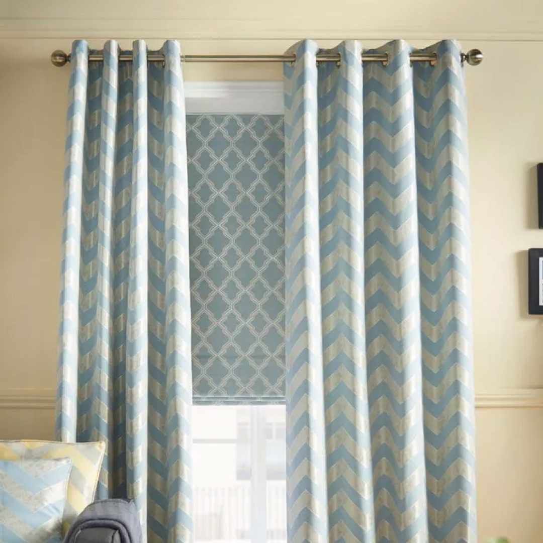 blue made to order curtains in front of made to measure roman blinds