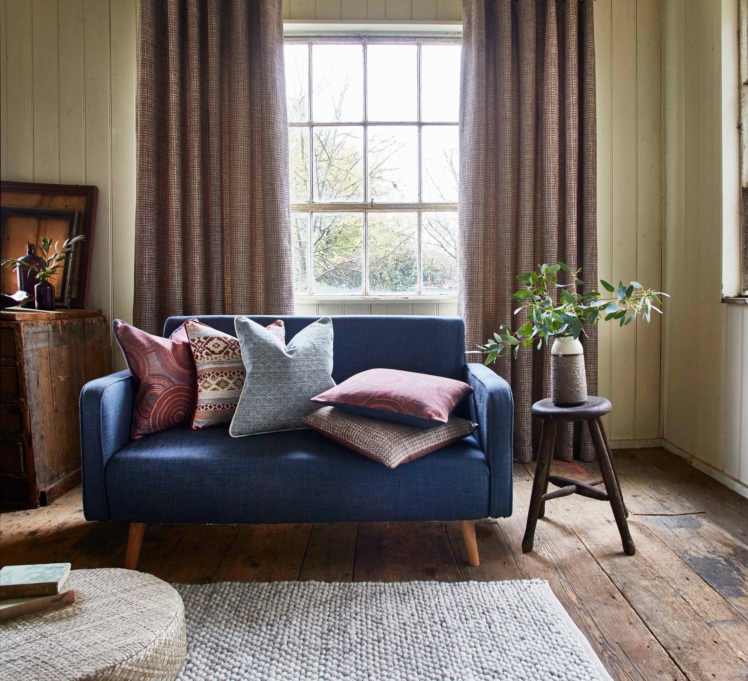 An image of a modern rustic style using fabrics from Prestigious Textile's Inca Trail collection